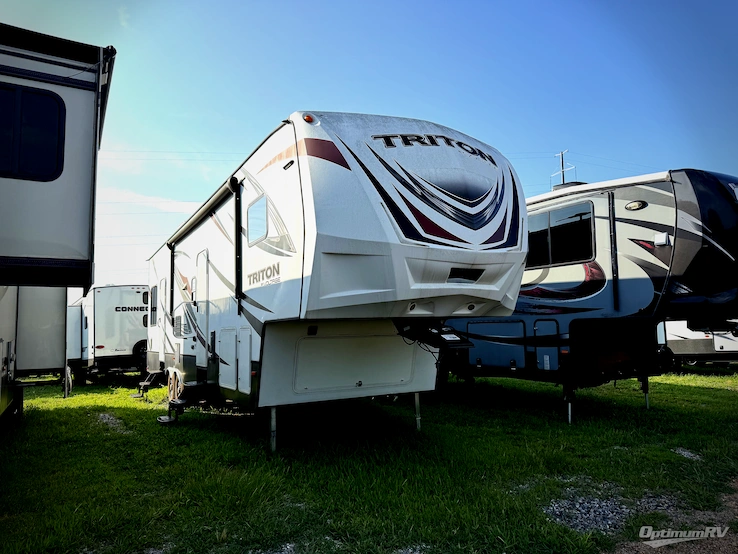 2016 Dutchmen Triton 3451 RV Photo 1