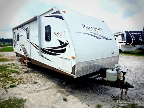 Used 2013 Keystone Passport 2890RL Grand Touring Featured Photo