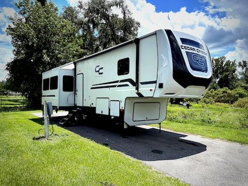 Used 2023 Forest River RV Cedar Creek Experience 3425RL Featured Photo